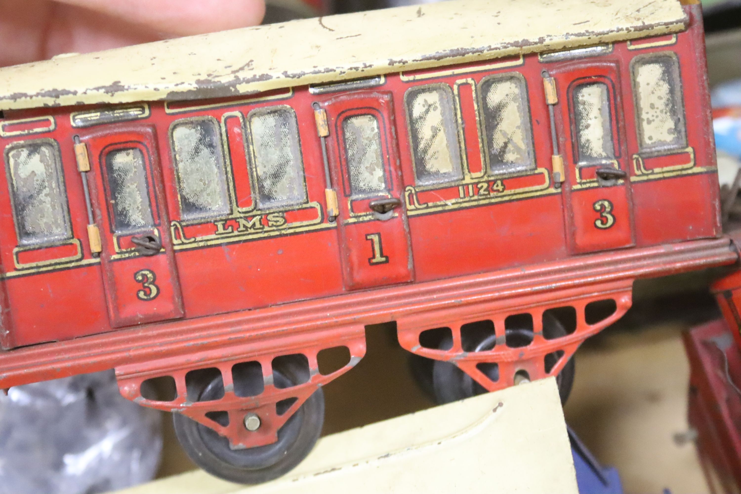 A Hornby O gauge toy train, largely pre-war and a Lehmann tinplate garage, No. 771